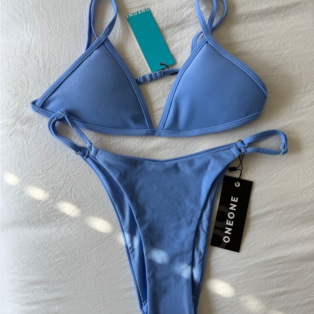 Oneone Blue Bikini Set
Top L 
Bottom M
The top is L but fit like M